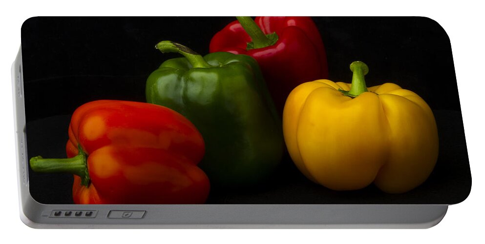 Fine Art Portable Battery Charger featuring the photograph Four Peppers by Frederic A Reinecke