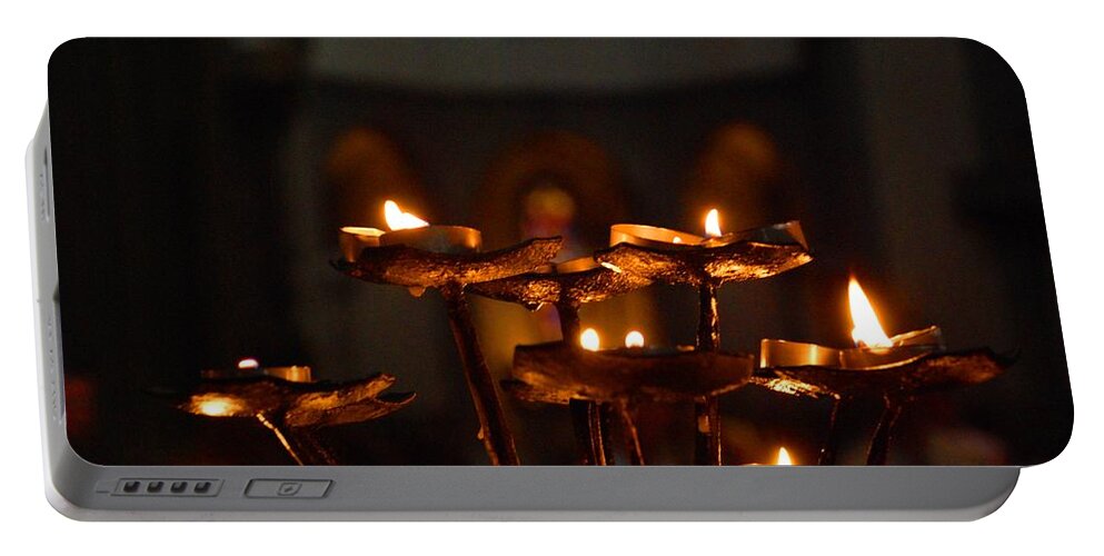 Candles Portable Battery Charger featuring the photograph Golden lights by Dany Lison