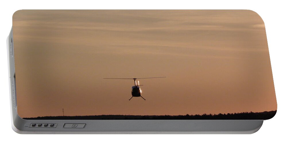 Helicopter Portable Battery Charger featuring the photograph Helicopter Flyover At Sunset by Kim Galluzzo Wozniak
