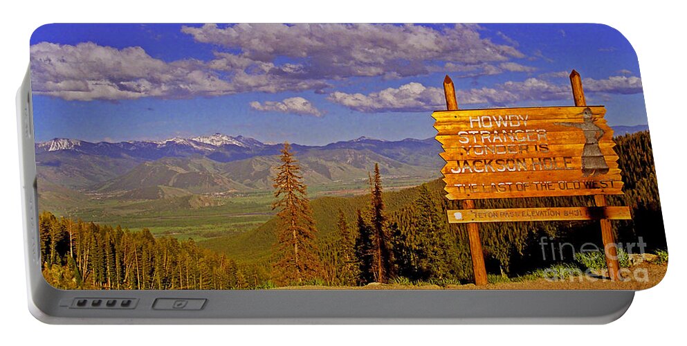 Idaho Portable Battery Charger featuring the photograph Jackson Hole Welcome Sign by Rich Walter