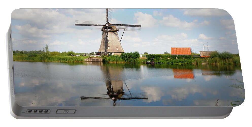 Windmill Portable Battery Charger featuring the photograph Kinderdijk Windmill by Lainie Wrightson