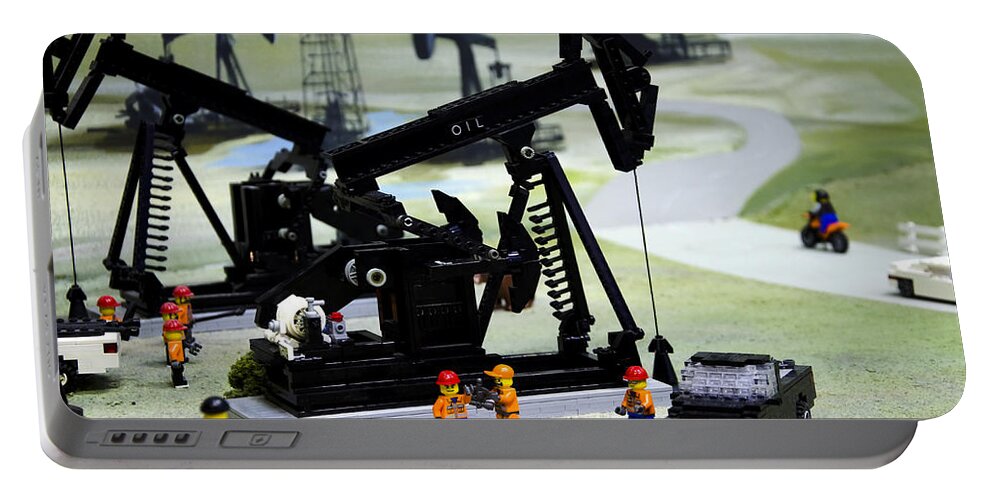 Legoland Portable Battery Charger featuring the photograph Lego Oil Pumpjacks by Ricky Barnard
