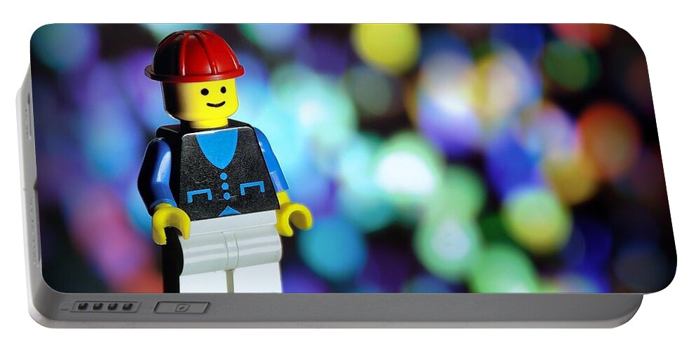 Toy Portable Battery Charger featuring the photograph LegoMan by Mark Fuller