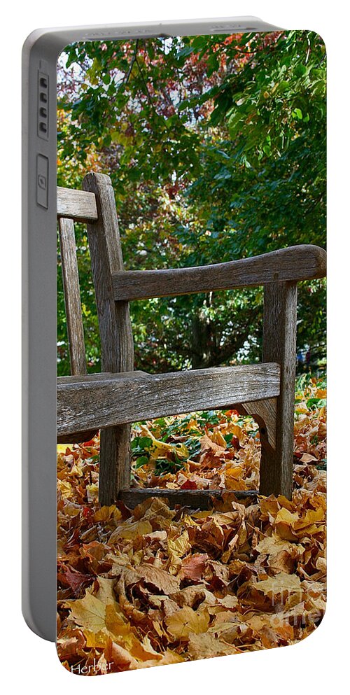 Outdoors Portable Battery Charger featuring the photograph Limited Outdoor Seating by Susan Herber