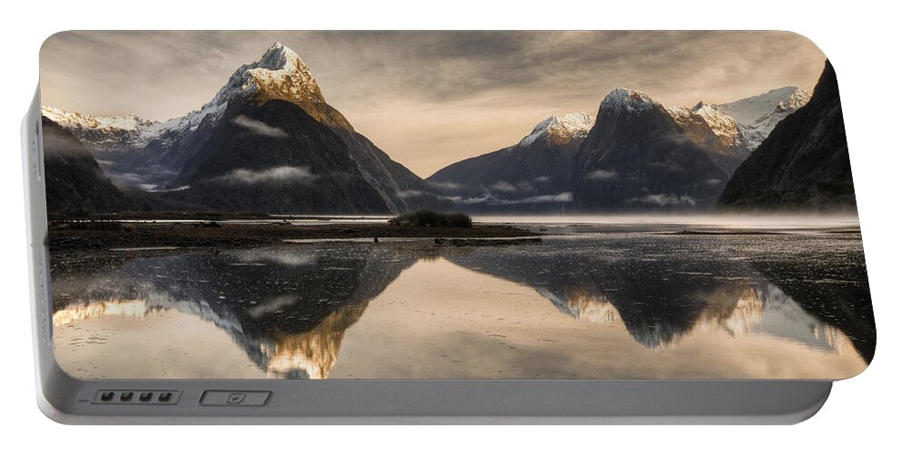 00446721 Portable Battery Charger featuring the photograph Mitre Peak And Milford Sound by Colin Monteath