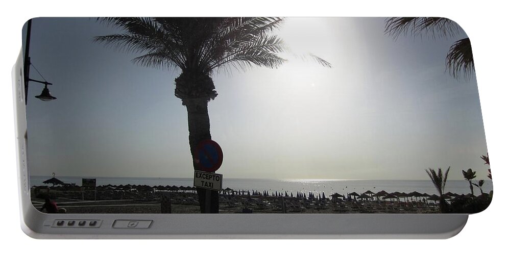 Costa Del Sol Portable Battery Charger featuring the photograph Palm Tree at Costa Del Sol Beach Spain by John Shiron