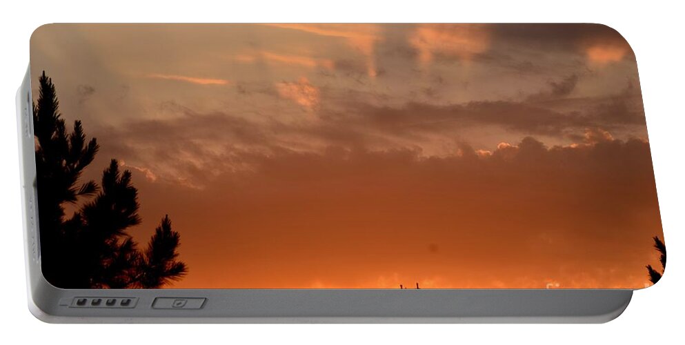 Sunrise Portable Battery Charger featuring the photograph Pink Rays and Orange Skies by Maria Urso