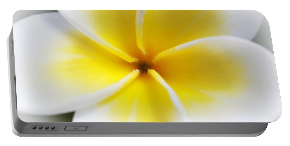 Artistic Portable Battery Charger featuring the photograph Plumeria Center by Joe Carini - Printscapes