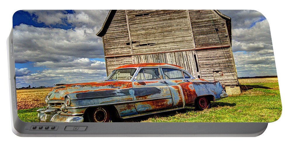  Portable Battery Charger featuring the photograph Rusty Old Cadillac by Peter Ciro