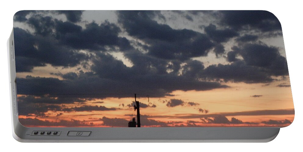 Sunset Portable Battery Charger featuring the photograph Sunset over the Outer Banks by Kim Galluzzo Wozniak
