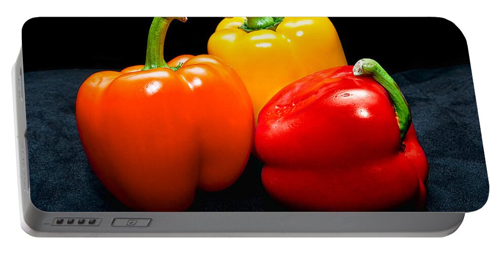Vegetable Portable Battery Charger featuring the photograph The Three Peppers by Christopher Holmes