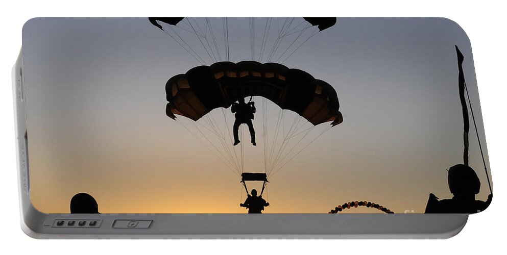 U.s. Army Golden Knights Portable Battery Charger featuring the photograph The U.s. Army Golden Knights Perform An by Stocktrek Images