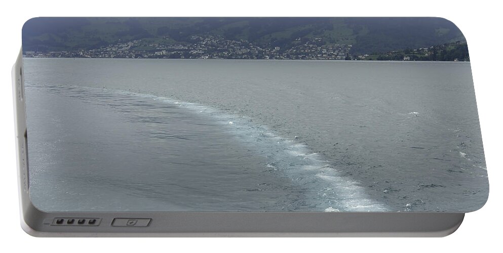 Action Portable Battery Charger featuring the photograph The wake of a cruise ship in Lake Lucerne by Ashish Agarwal