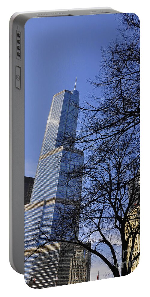 Trump Tower Portable Battery Charger featuring the photograph Trough the branches by Dejan Jovanovic