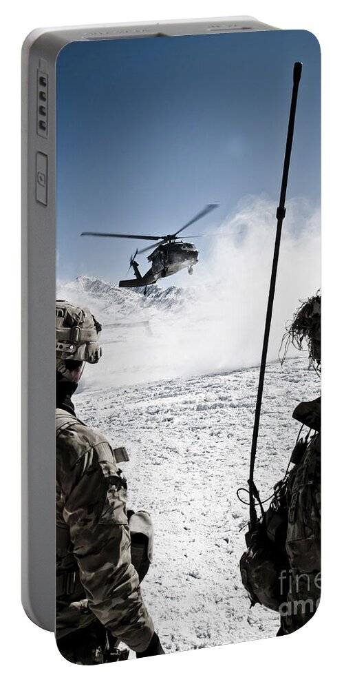 Marzak Portable Battery Charger featuring the photograph U.s. Army Soldiers Watch The Arrival by Stocktrek Images