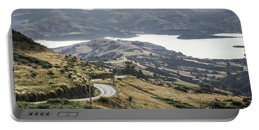Banks Peninsula Portable Battery Charger featuring the photograph Banks peninsula near Chirstchurch in New Zealand #1 by Didier Marti