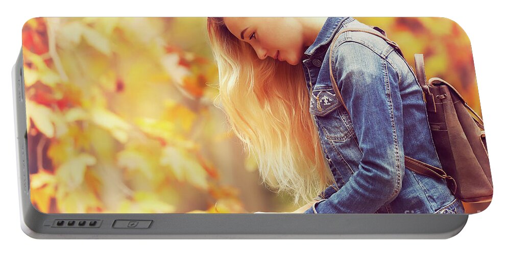 Autumn Portable Battery Charger featuring the photograph Beautiful model in autumn park #1 by Anna Om