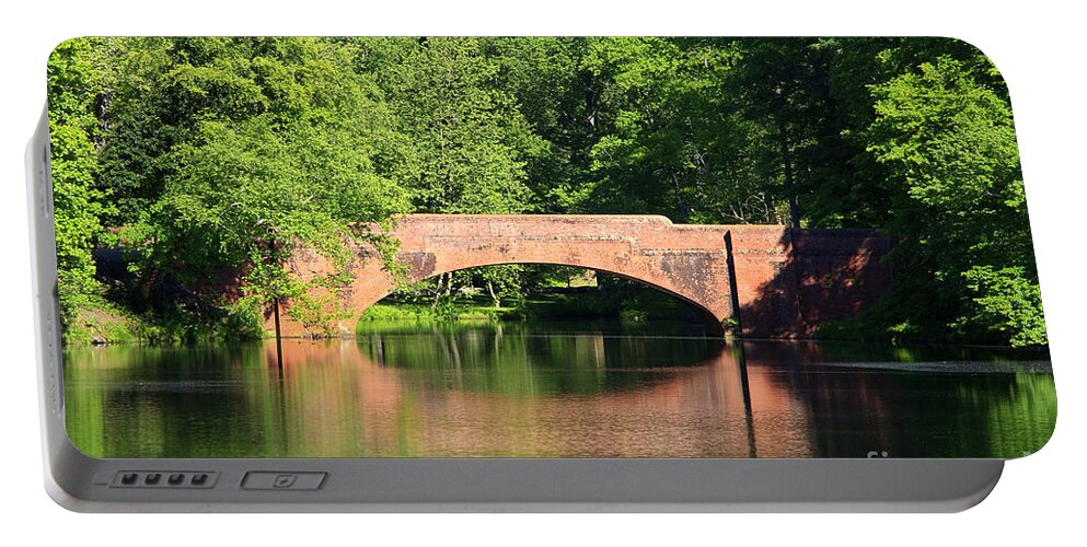 Bass Portable Battery Charger featuring the photograph Bridge Reflection in the Spring #1 by Jill Lang