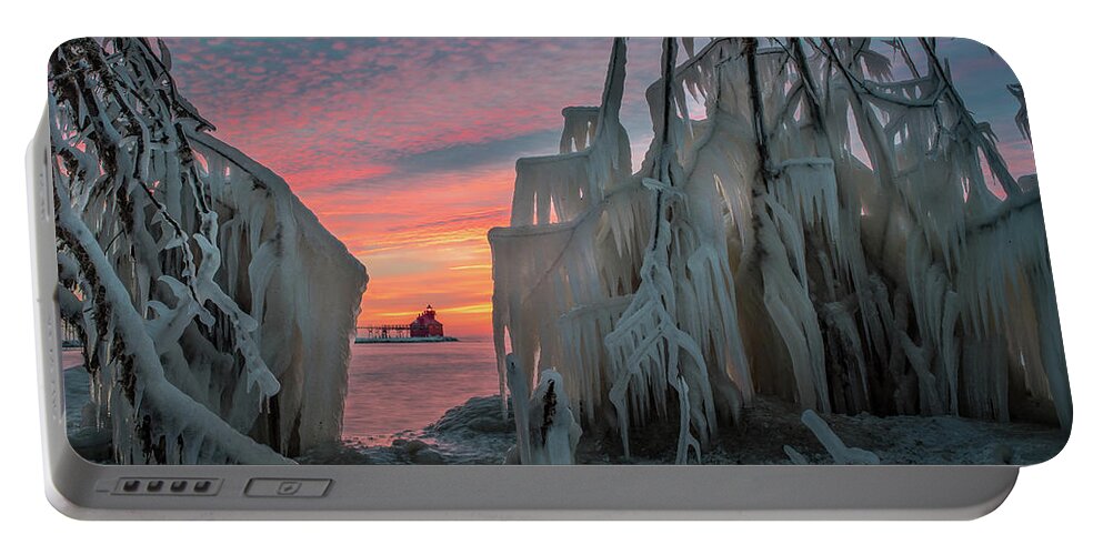 #wisconsin #outdoor #fineart #landscape #photograph #wisconsinbeauty #doorcounty #doorcountybeauty #sony #canonfdglass #beautyofnature #history #metalman #passionformonotone #homeandofficedecor #streamingmedia #dawn #icecovered #lighthouse #lakemichigan #winter #clouds #sky #framing Portable Battery Charger featuring the photograph Distant Lighthouse #1 by David Heilman