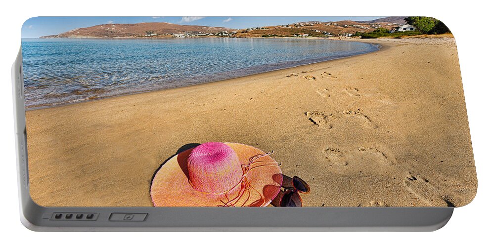 Andros Portable Battery Charger featuring the photograph Footsteps on the beach #1 by Constantinos Iliopoulos