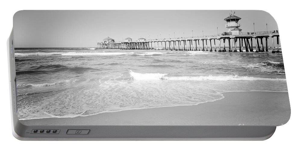 America Portable Battery Charger featuring the photograph Huntington Beach Pier Black and White Photo #2 by Paul Velgos