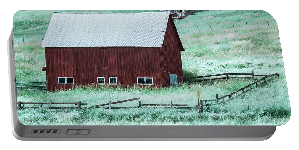 Red Portable Battery Charger featuring the photograph landscape with a red barn in rural Montana and Rocky Mountains #1 by Alex Grichenko
