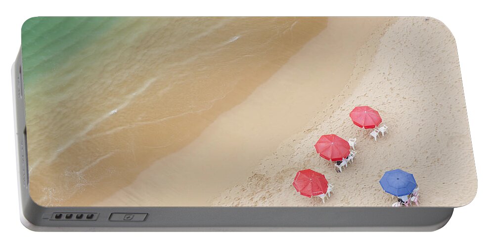 Portable Battery Charger featuring the photograph Looking down at a beach #2 by Anthony Totah
