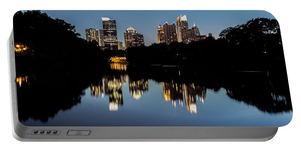 Skyline Portable Battery Charger featuring the photograph Midtown Skyline #1 by Mike Dunn