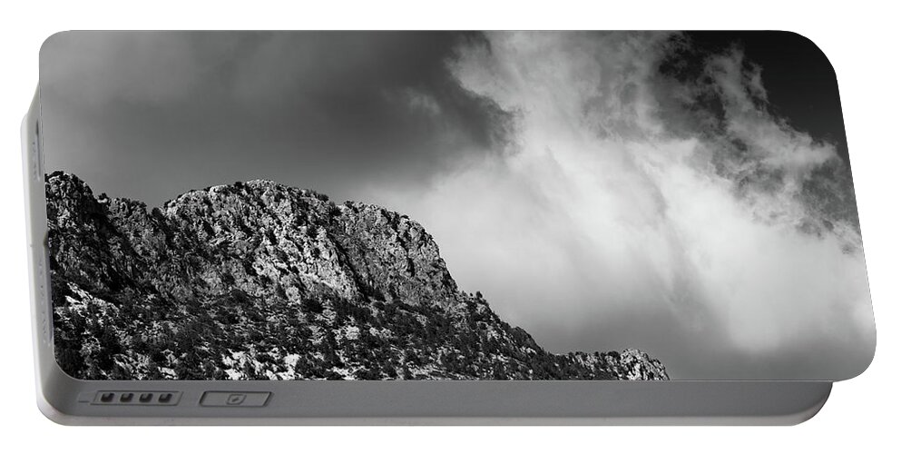 Mountain Landscape Portable Battery Charger featuring the photograph Mountain range peak covered with dramatic clouds #1 by Michalakis Ppalis