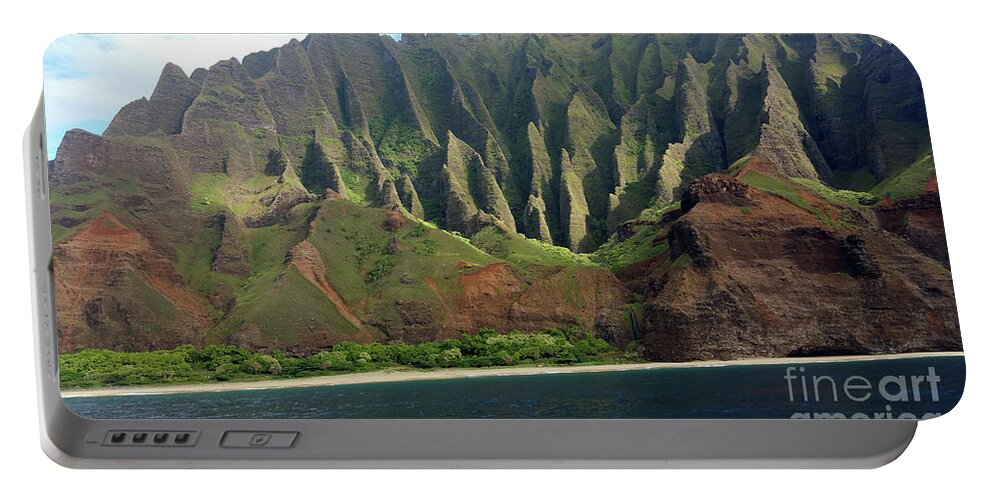 Cliffs Portable Battery Charger featuring the photograph Na Pali Coast #1 by Karen Nicholson