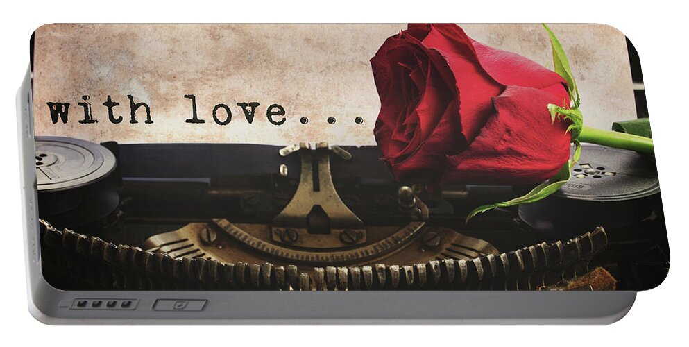 Typewriter Portable Battery Charger featuring the photograph Red Rose On Typewriter #1 by Anastasy Yarmolovich