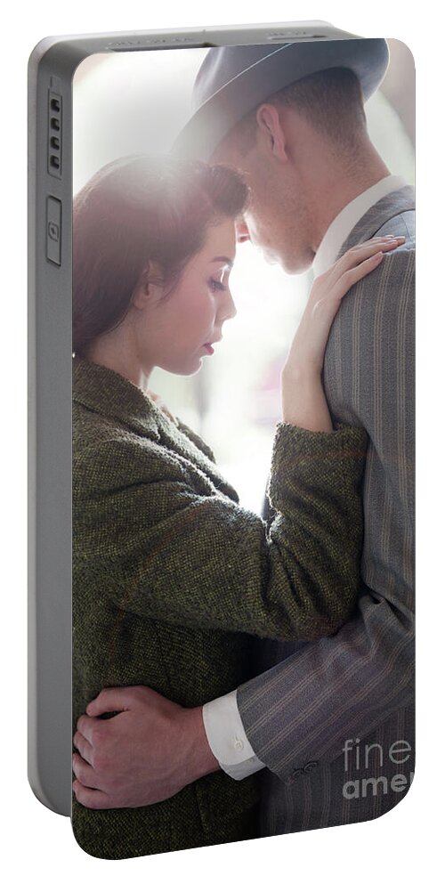 1940s Portable Battery Charger featuring the photograph Sad 1940s Couple Embracing #1 by Lee Avison