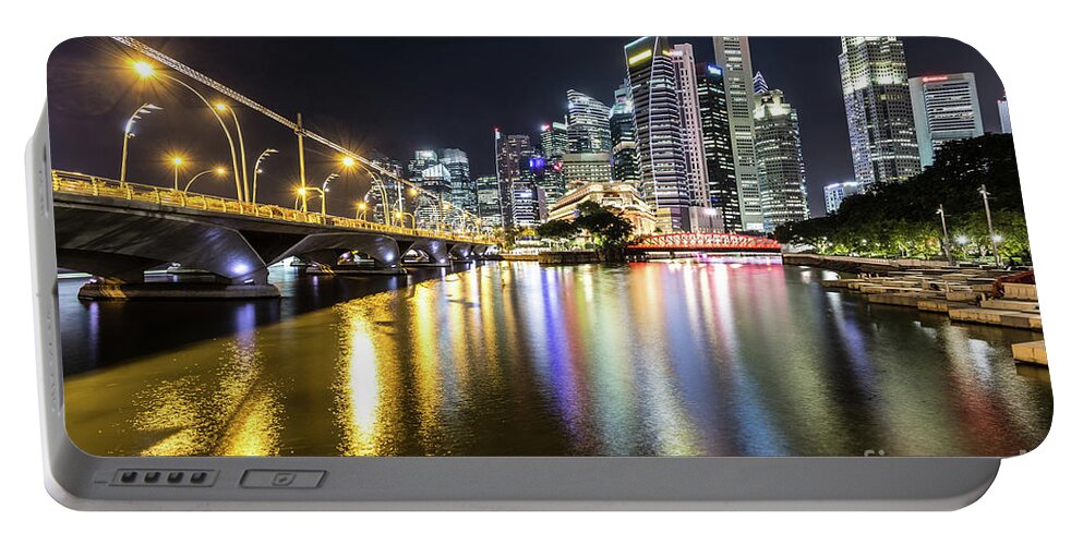Singapore River Portable Battery Charger featuring the photograph Singapore river at night with financial district in Singapore #1 by Didier Marti