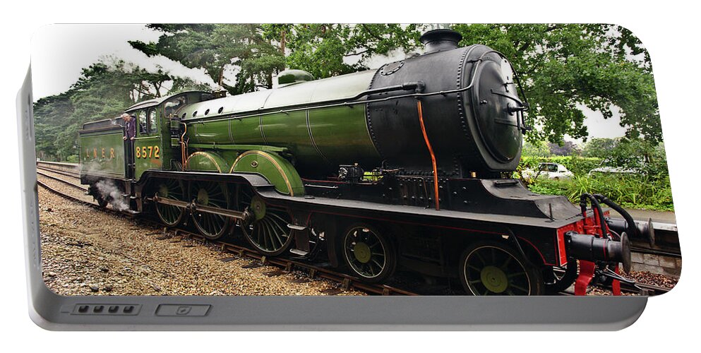 Norfolk Portable Battery Charger featuring the photograph Steam locomotive in England #1 by Paul Cowan