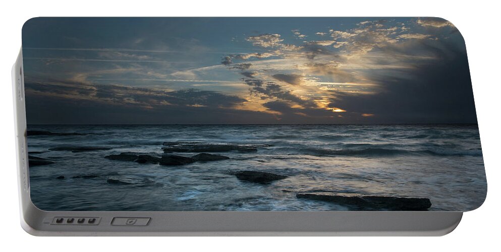 Sunset Over Sea Portable Battery Charger featuring the photograph Sunset on a rocky beach #2 by Michalakis Ppalis
