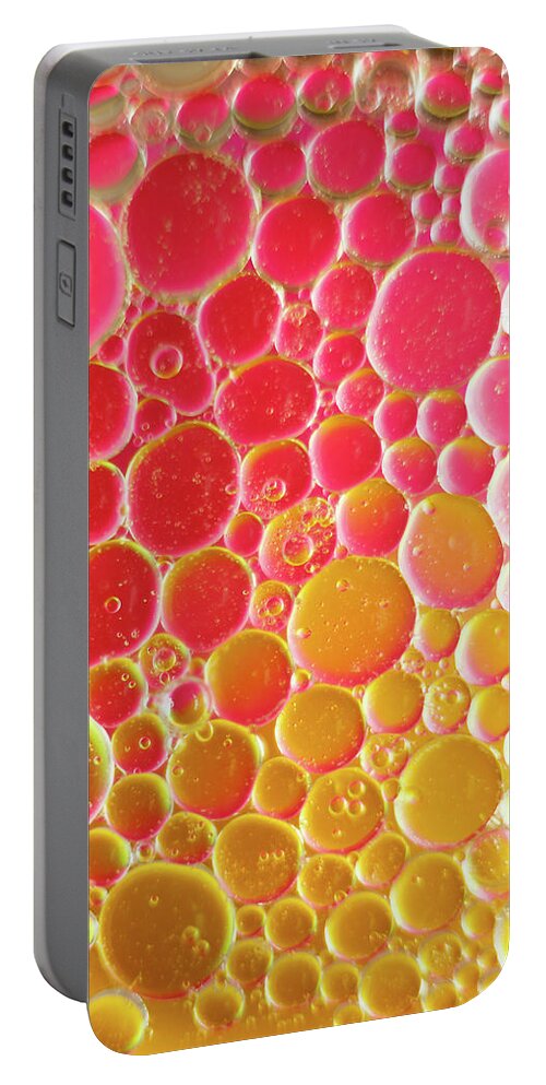 Water Portable Battery Charger featuring the photograph Water and oil Bubbles #1 by Andy Myatt