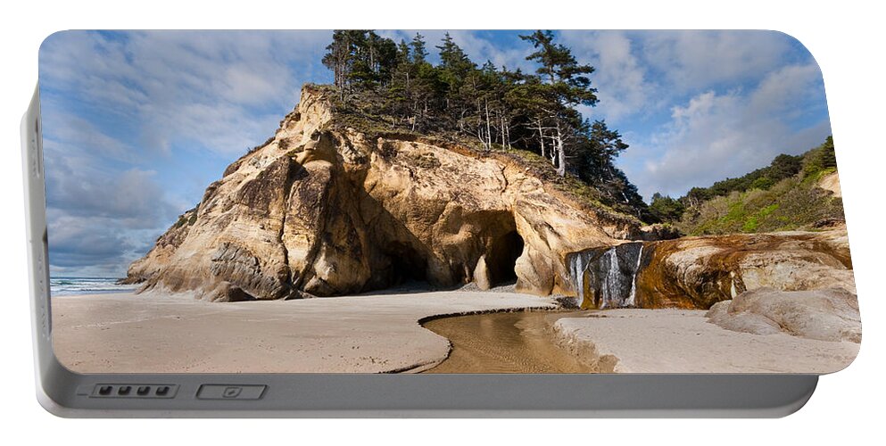 Beach Portable Battery Charger featuring the photograph Waterfall Flowing into the Pacific Ocean by Jeff Goulden