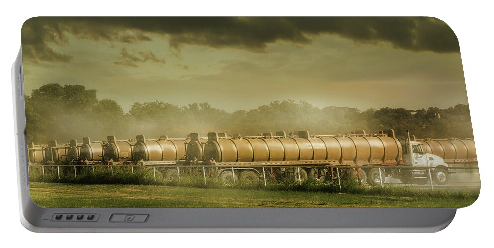 Tank Trucks Portable Battery Charger featuring the photograph 12 Tank Trucks Warming Up by Micah Offman