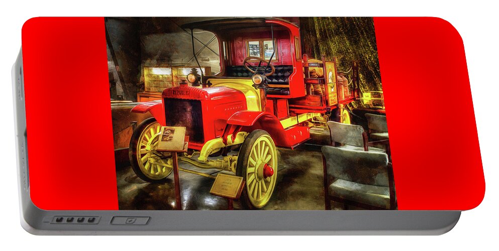  Portable Battery Charger featuring the photograph 1919 Republic Truck by Thom Zehrfeld