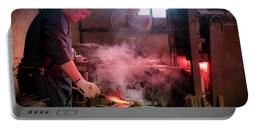 Blacksmith Portable Battery Charger featuring the photograph 4th Generation Blacksmith, Miki City Japan by Perry Rodriguez
