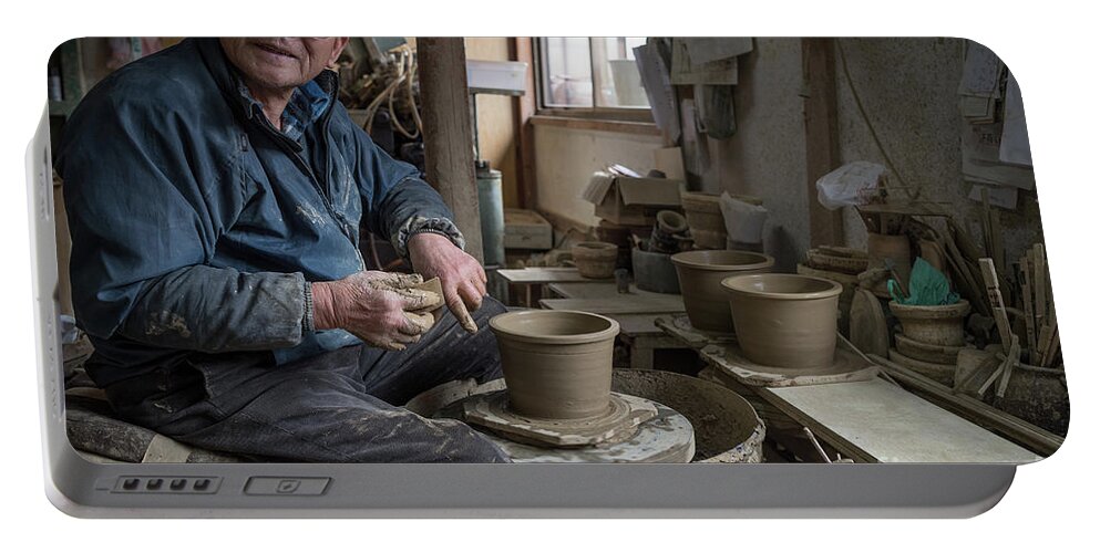 Pottery Portable Battery Charger featuring the photograph A Village Pottery Studio, Japan by Perry Rodriguez