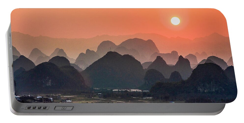Karst Portable Battery Charger featuring the photograph Karst mountains scenery in sunset #20 by Carl Ning
