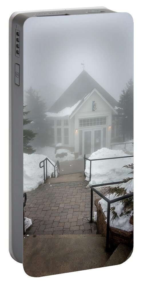 Foggy Portable Battery Charger featuring the photograph Beautiful street of american town village in mountains in winter #3 by Alex Grichenko