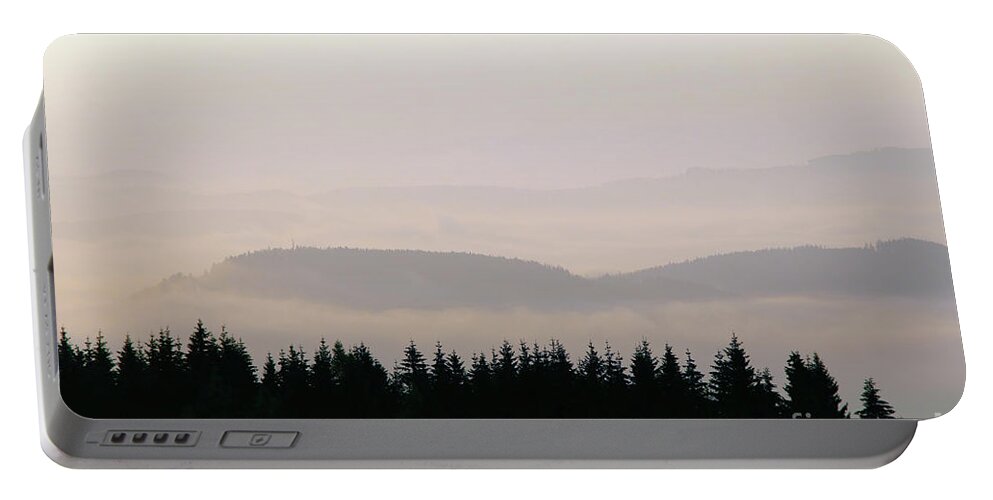 Hill Portable Battery Charger featuring the photograph Forested hills in early morning mist #3 by Michal Boubin