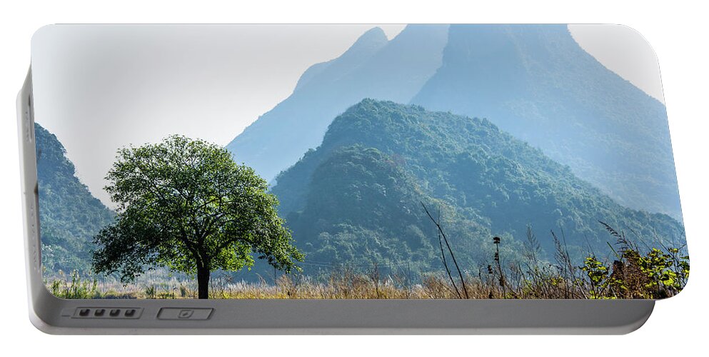 The Karst Mountains Scenery In Winter Portable Battery Charger featuring the photograph Karst mountains scenery in winter #5 by Carl Ning