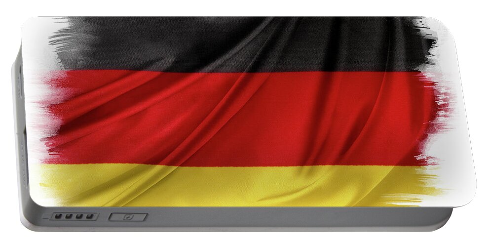 Flag Portable Battery Charger featuring the photograph German flag #7 by Les Cunliffe