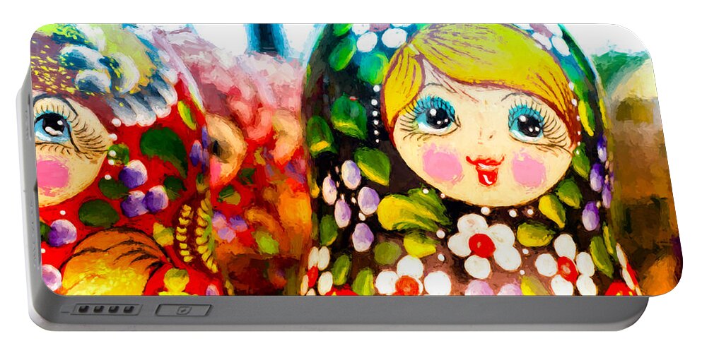Puzzle Doll Portable Battery Charger featuring the photograph Vibrant Russian Matrushka Doll by John Williams