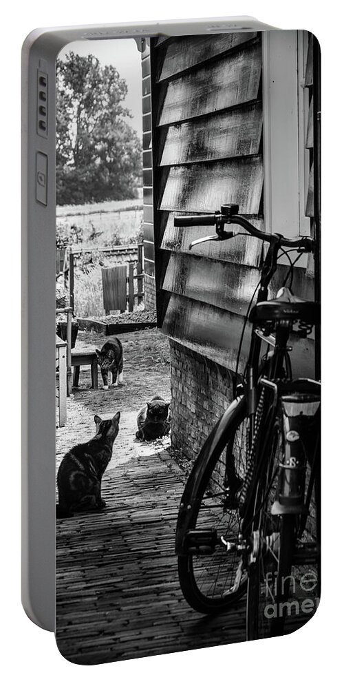 Europe Portable Battery Charger featuring the photograph A Backstreet With Cats And Bicycle In Marken B/W by RicardMN Photography