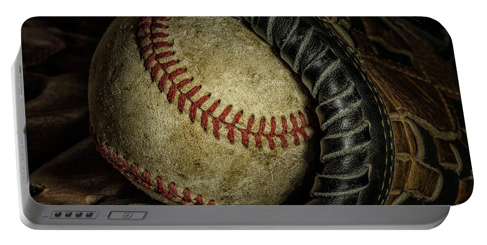 Baseball Portable Battery Charger featuring the photograph A Baseball Still Life by Tom Mc Nemar