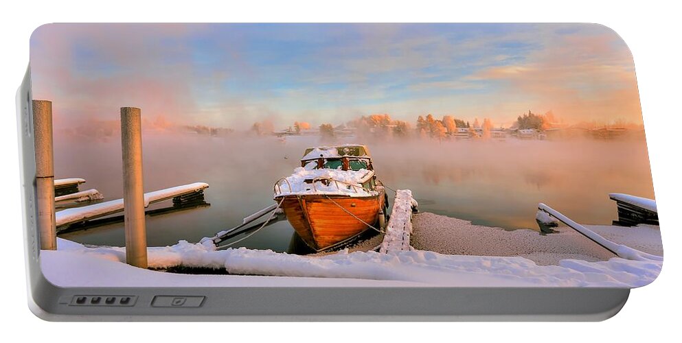 Landscape Portable Battery Charger featuring the photograph Boat on frozen lake by Rose-Maries Pictures